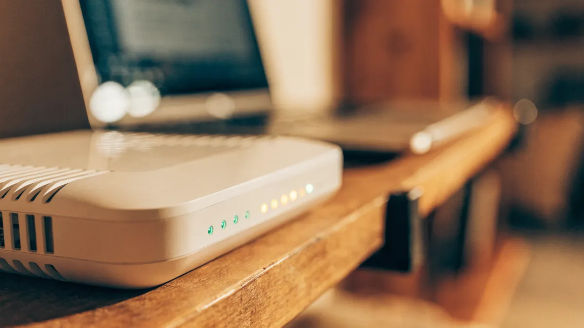 Fiber router with indicator lights in a modern Spanish apartment