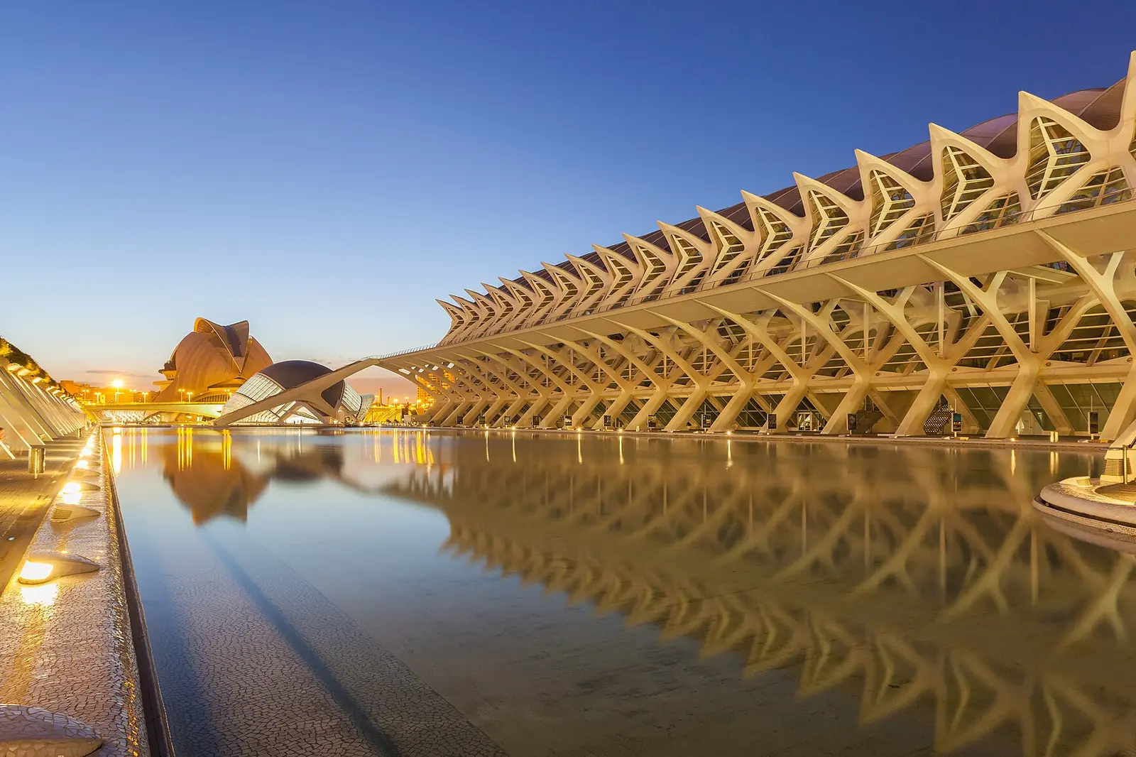 The Museu de les Ciències and L'Hemisfèric at dusk in the Ciutat de les Arts i les Ciències, Valencia