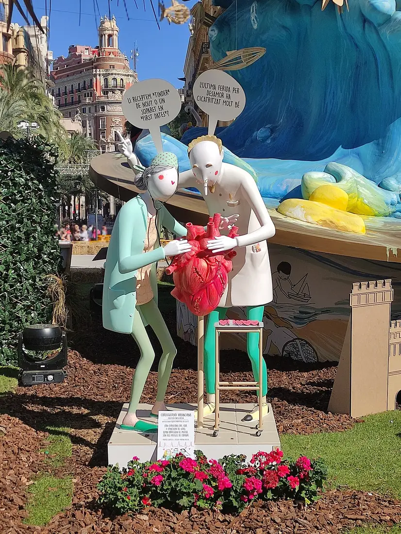 Colourful satirical ninots of a Las Fallas monument in the Plaza del Ayuntamiento, Valencia